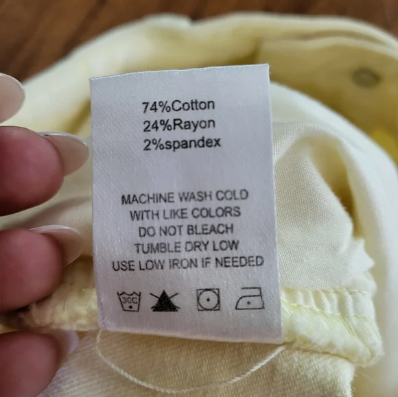 Mid-rise Yellow Distressed Shorts - Picture 5 of 10